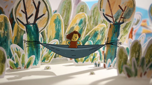 Stop-Motion-Set aus Papierobjekten mit Zeichentrickfigur